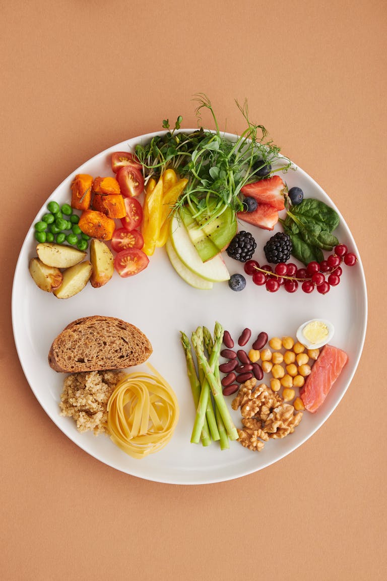 Colorful assortment of healthy foods on a plate, perfect for a balanced diet.